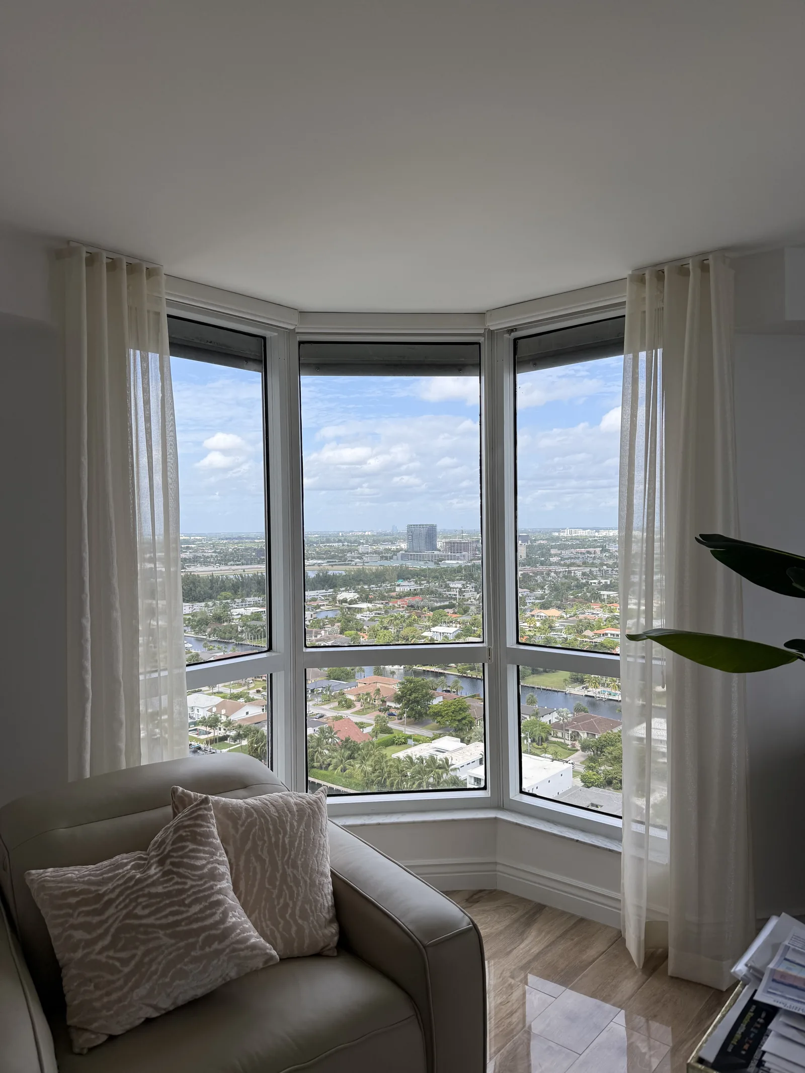 Sheer drapery on a curved bay window