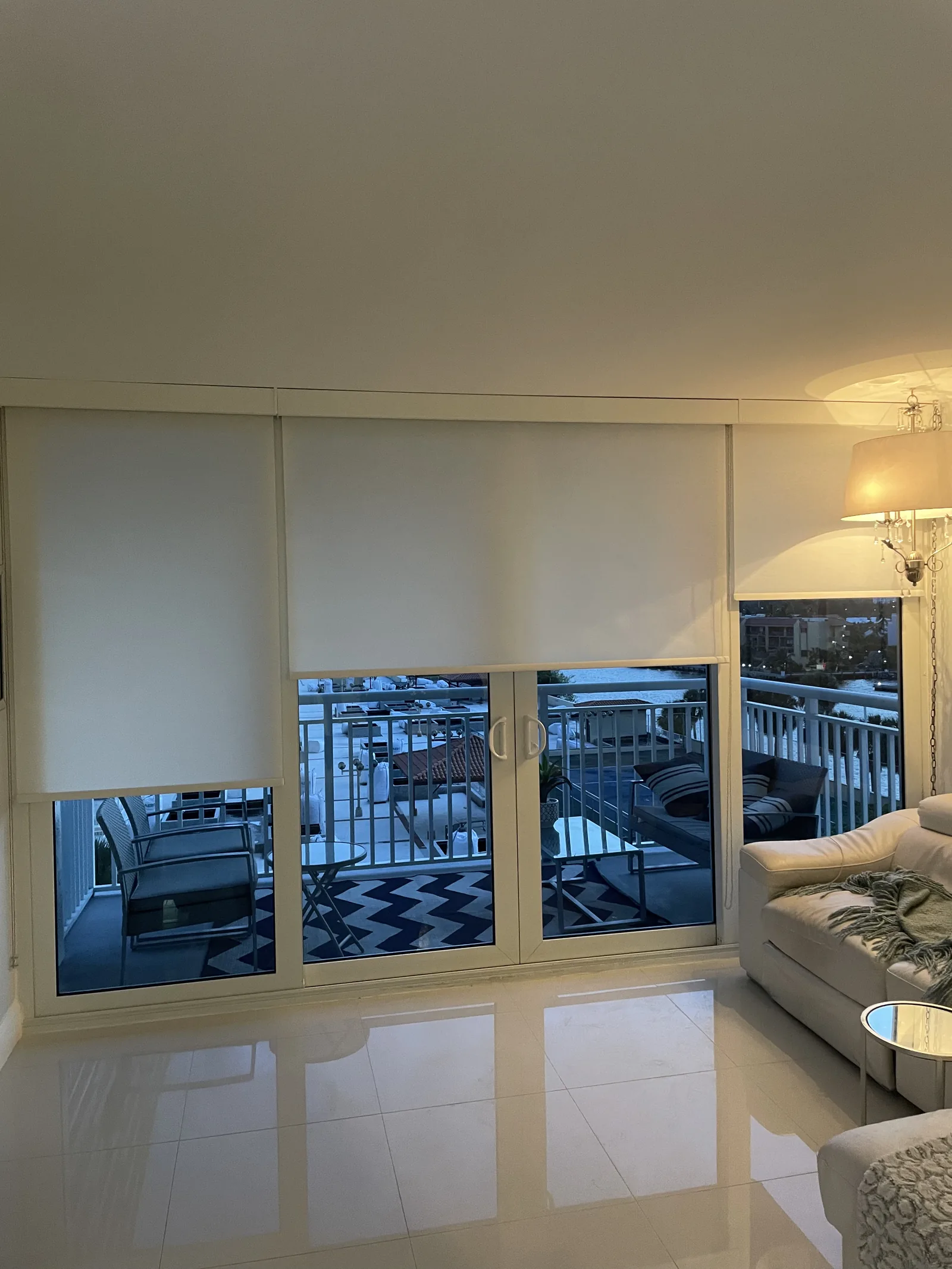 Light-filtering roller shades in an open living room